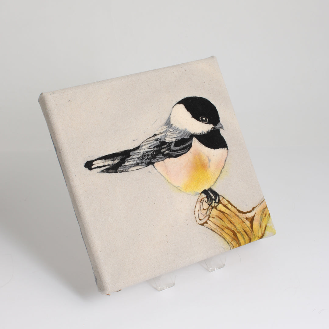 Chickadee on a Stump