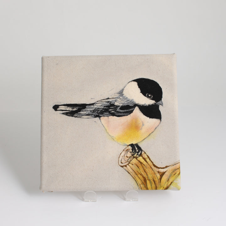 Chickadee on a Stump