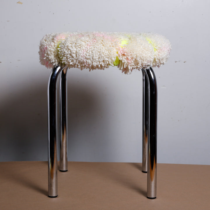 White plaid/neon green stool