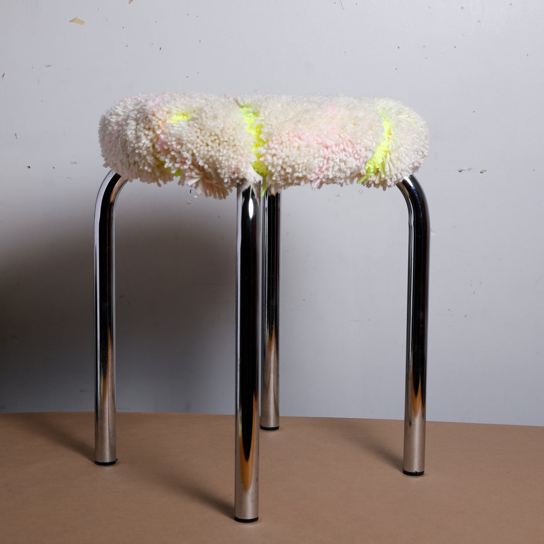 White plaid/neon green stool