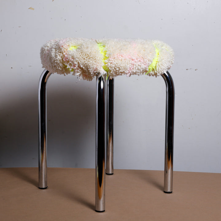 White plaid/neon green stool