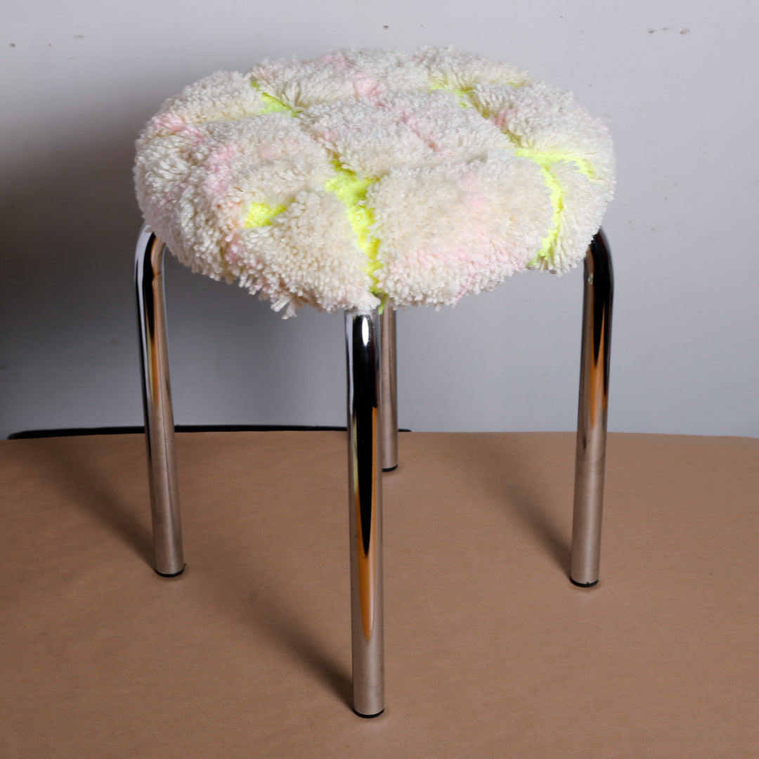 White plaid/neon green stool