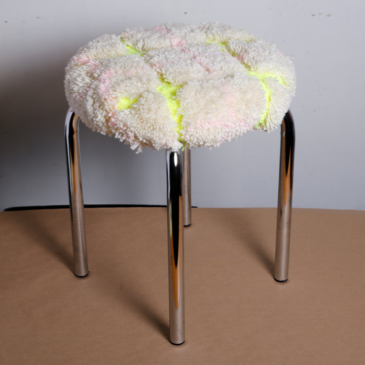 White plaid/neon green stool