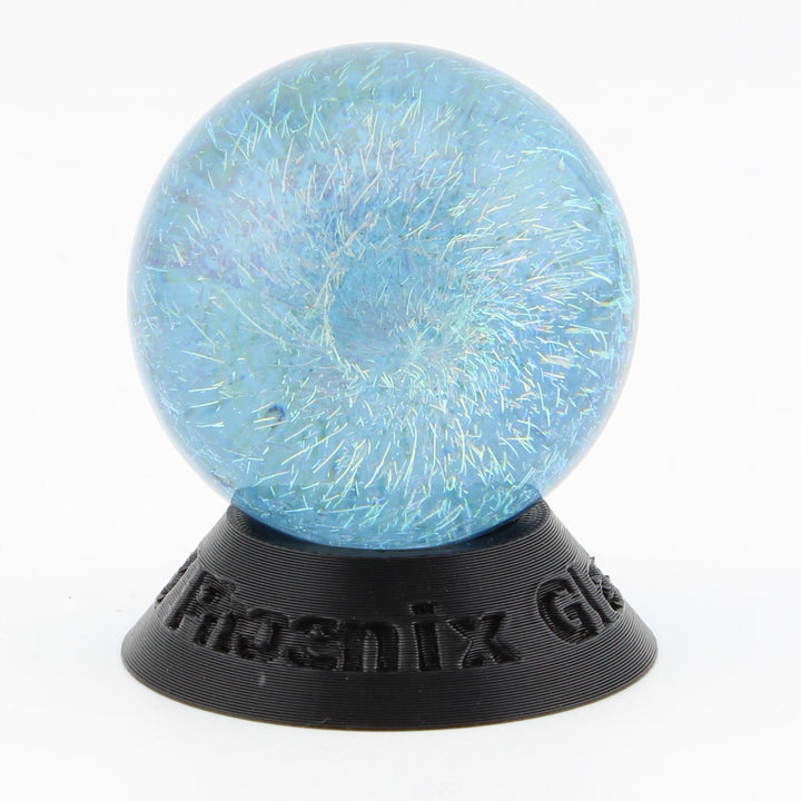 #8 Rainbow Dichroic Chaos Glass Marble on Sparkly Blue