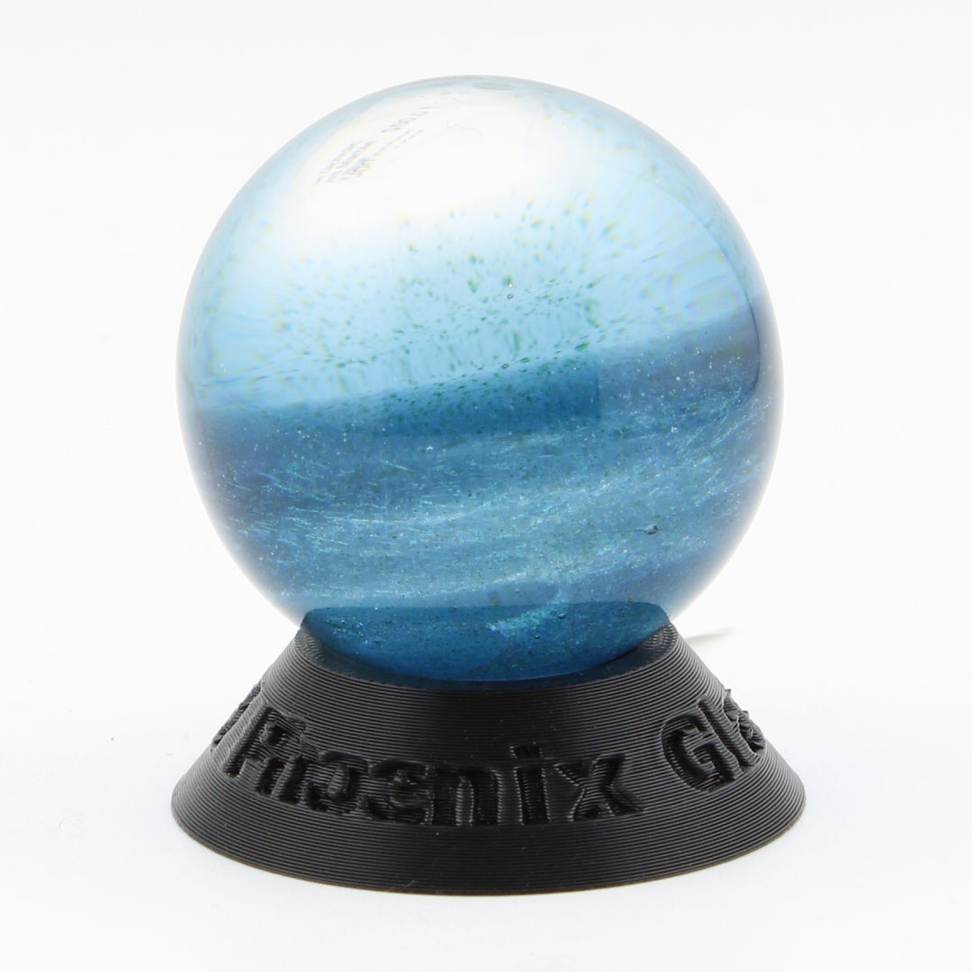 #8 Rainbow Dichroic Chaos Glass Marble on Sparkly Blue