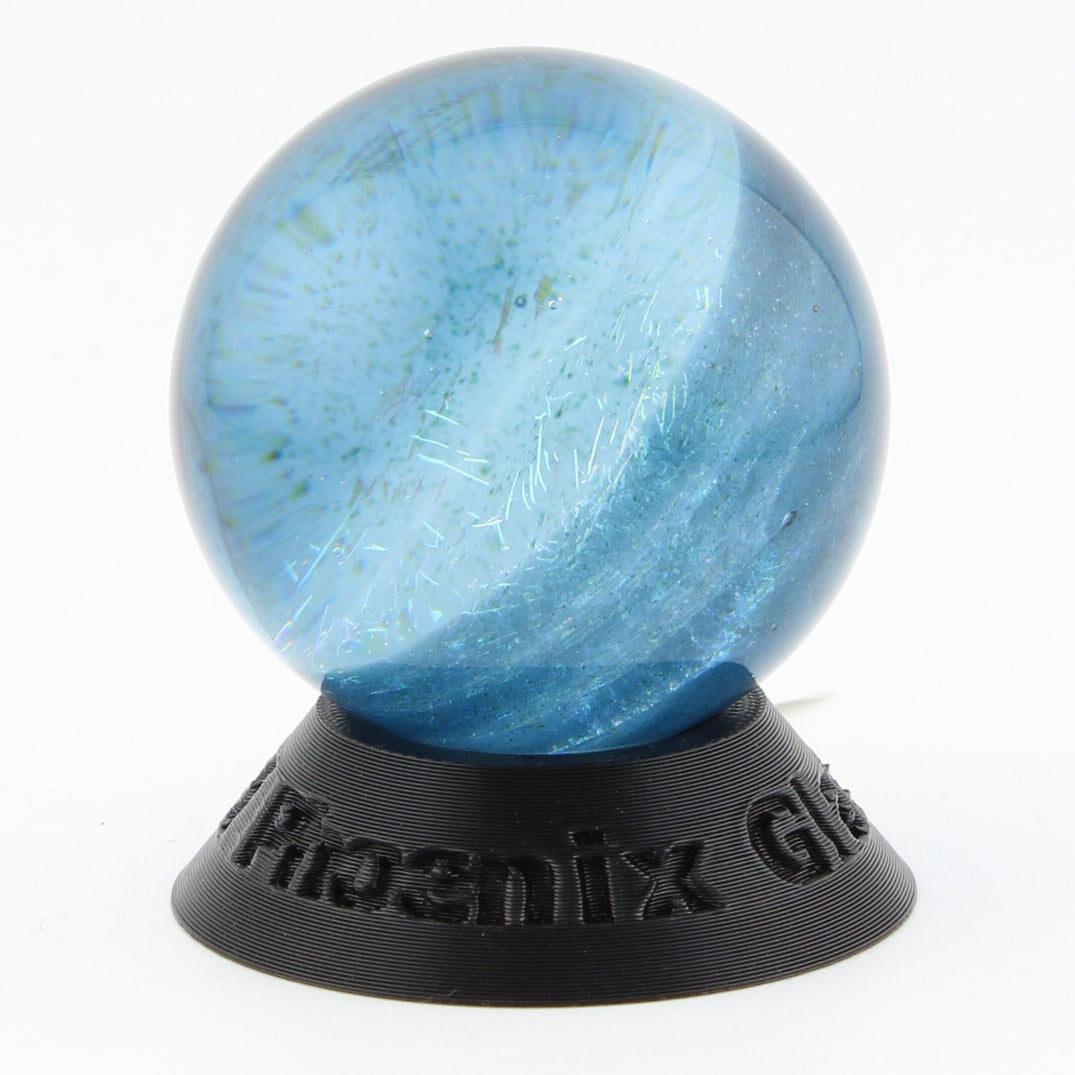 #8 Rainbow Dichroic Chaos Glass Marble on Sparkly Blue