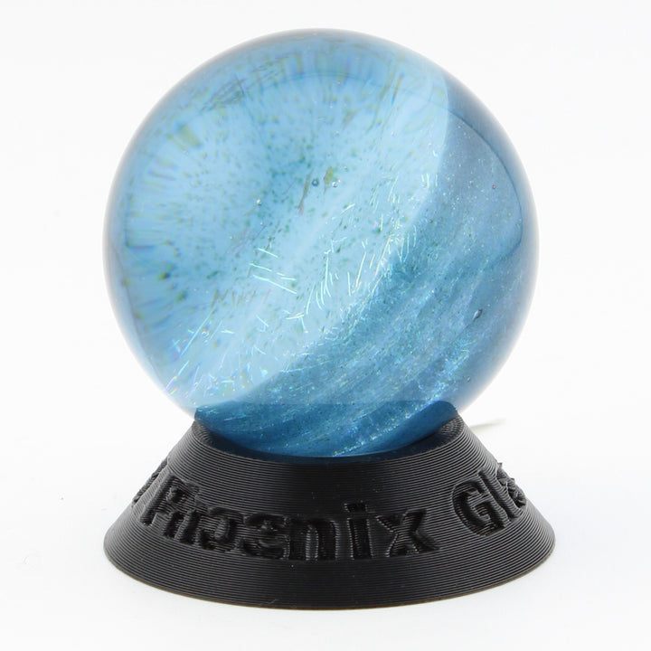 #8 Rainbow Dichroic Chaos Glass Marble on Sparkly Blue