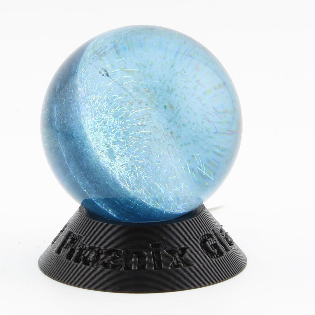 #8 Rainbow Dichroic Chaos Glass Marble on Sparkly Blue