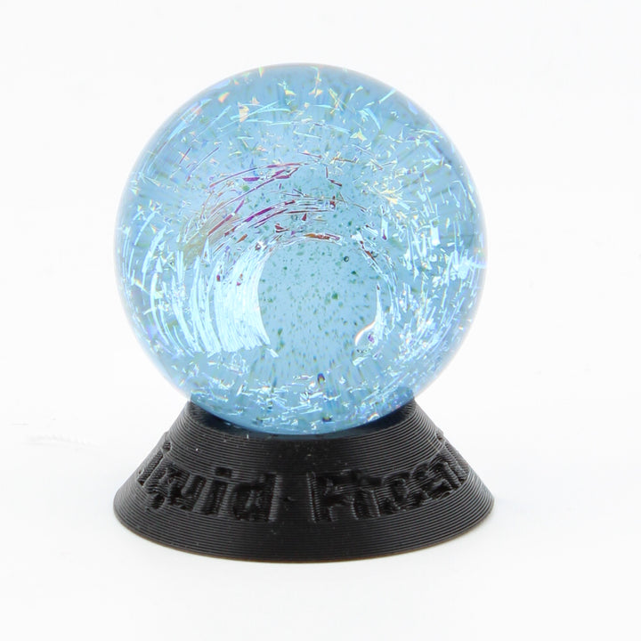 #10 Rainbow Dichroic Chaos Glass Marble on Sparkle Blue