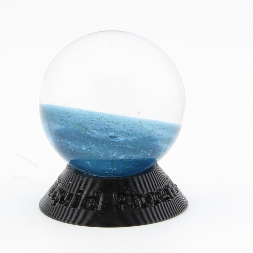 #10 Rainbow Dichroic Chaos Glass Marble on Sparkle Blue